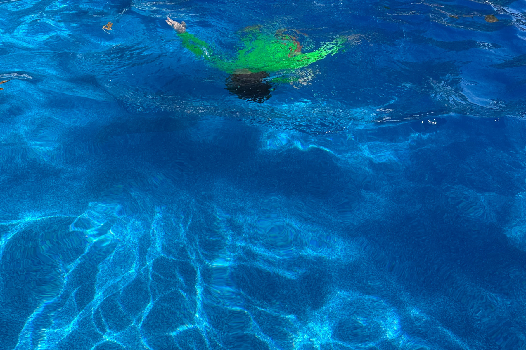 Why Neon Wins: The Safest Swimsuit Colors for Kids in Pools, Lakes, and Oceans