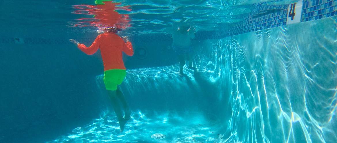 What Is the Safest Swimsuit Color for Kids in Pools and Lakes?