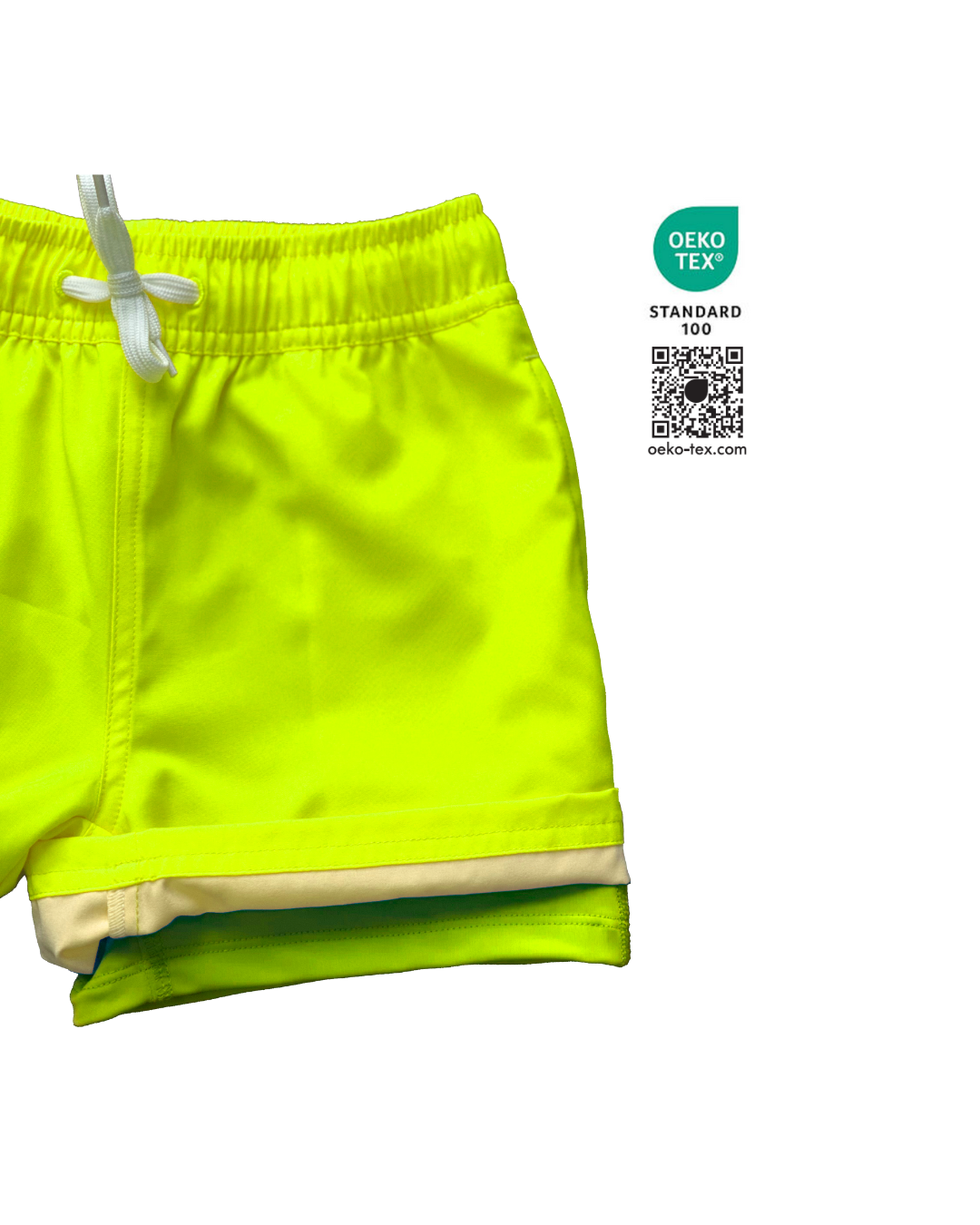 Boys bright neon yellow swim shorts with neon yellow boxer brief liner for anti-chaff comfort, quick drying,  with a functional drawstring and a full waist elastic band and reinforced pockets. The neon orange boys hybrid swim trunks stand out against any background. 