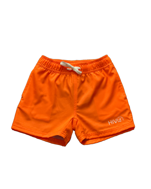 Boys bright neon orange swim shorts with neon yellow boxer brief liner for anti-chaff comfort, quick drying,  with a functional drawstring and a full waist elastic band and reinforced pockets. The neon orange boys hybrid swim trunks stand out against any background. 