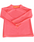 A product photo of a neon toddler girls rash guard long-sleeve swim shirt in neon coral. 