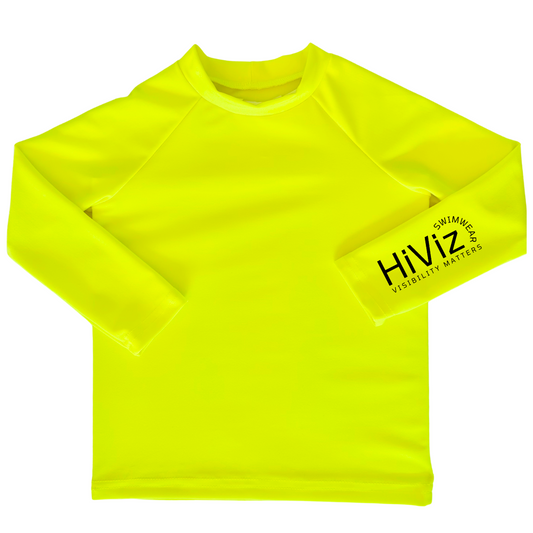 Bright swimwear for toddlers, this is a product image of a toddler neon yellow rash guard with HiViz bright swimwear logo on the left sleeve. 