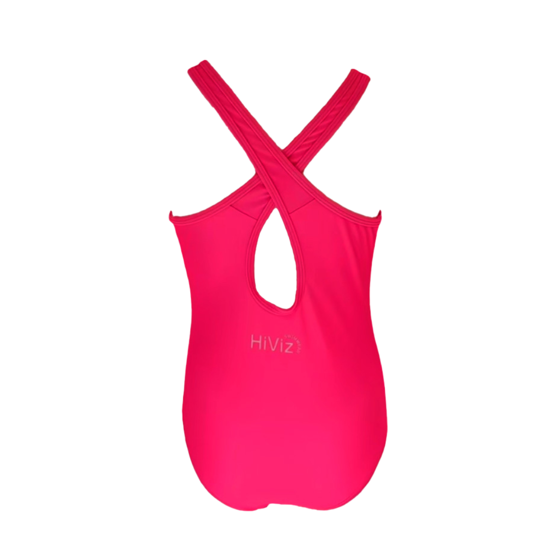 Product image of a women's neon pink swimsuit one-piece on a white background. The back of the neon pink swimsuit one-piece with crisscrossed straps. The neon pink swimsuit glows, super bright swimwear.